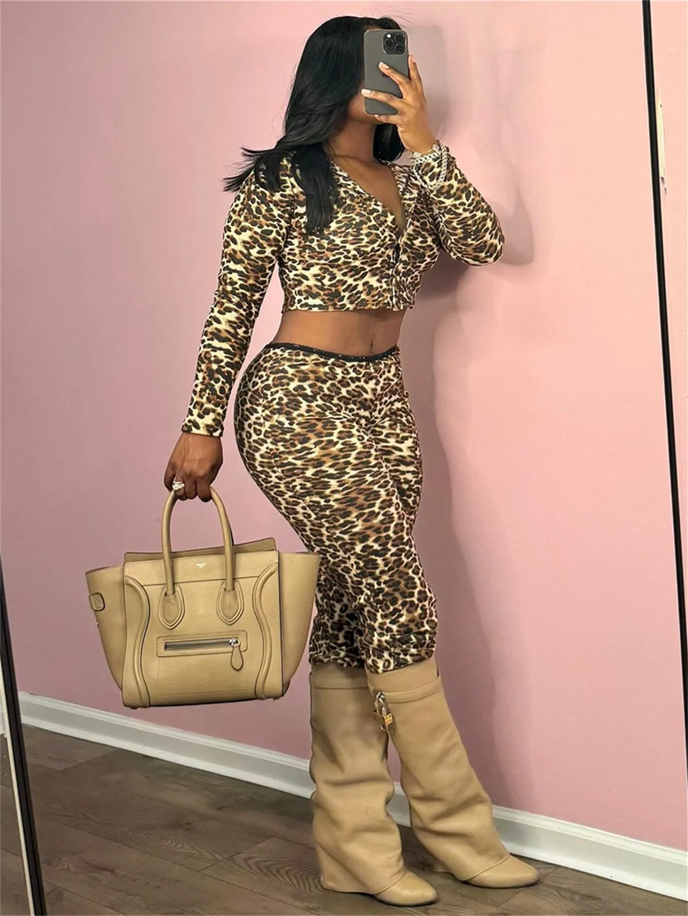 Bold Leopard Print Two-Piece Set with Long-Sleeve Crop Top and Fitted Pants