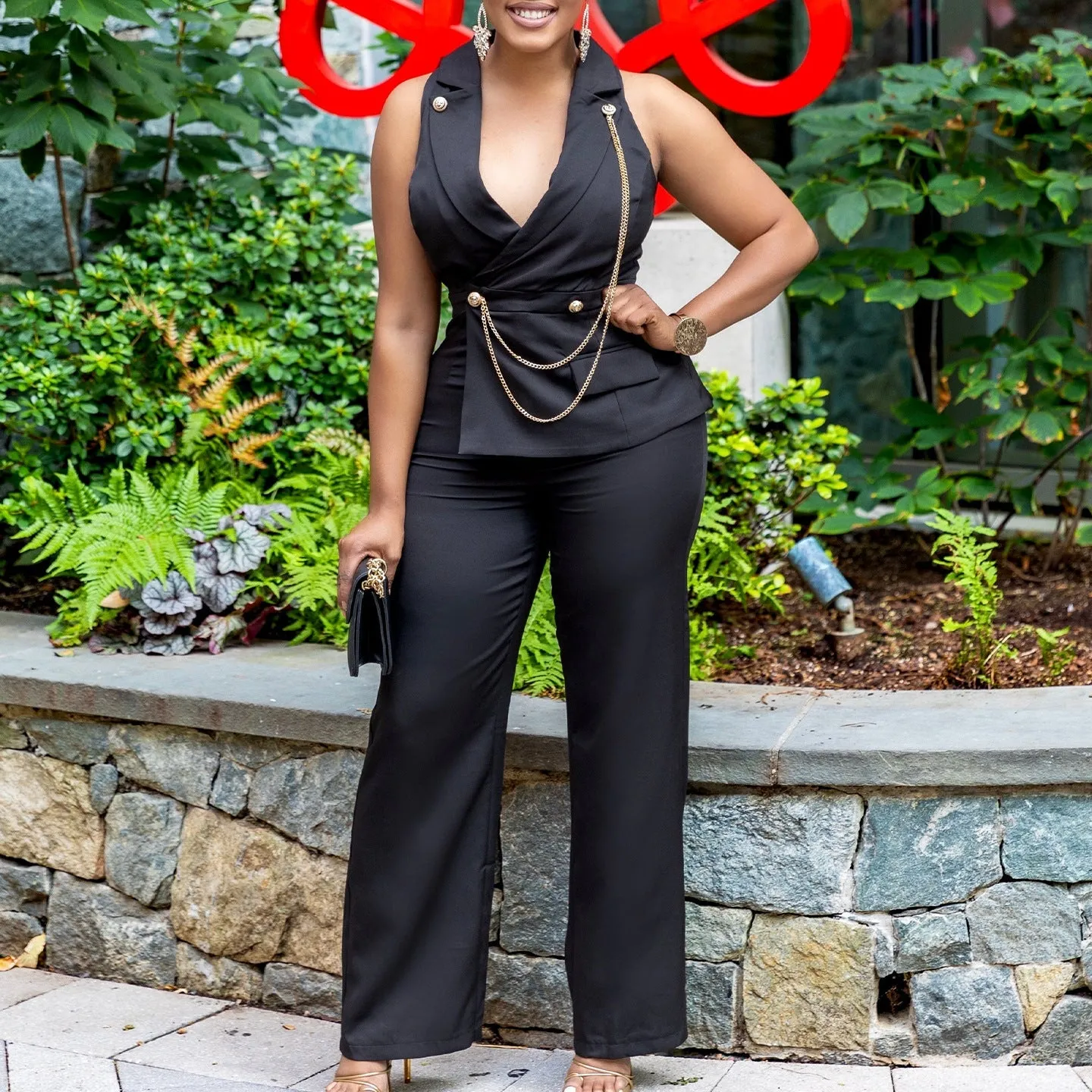Bold Turndown Collar Wide-Leg Jumpsuit with Stylish Chain Detail