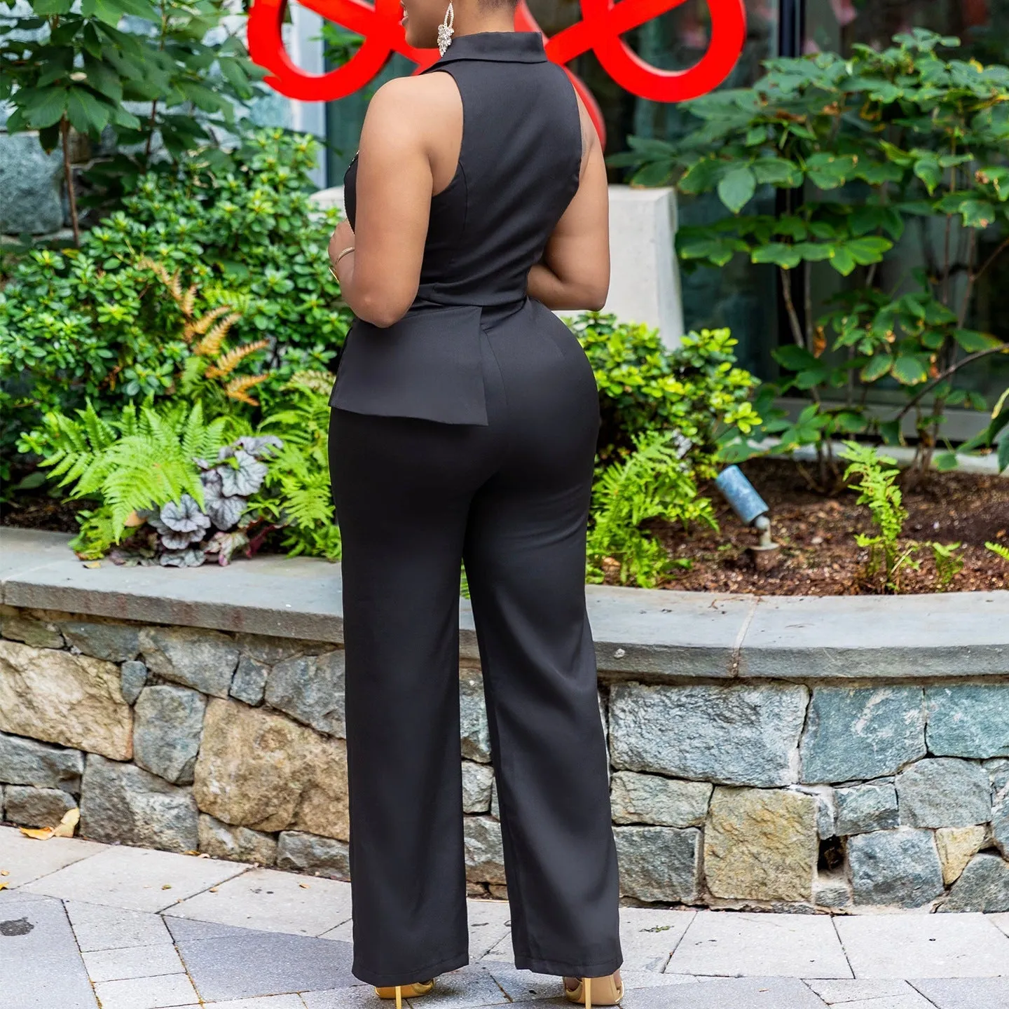 Bold Turndown Collar Wide-Leg Jumpsuit with Stylish Chain Detail