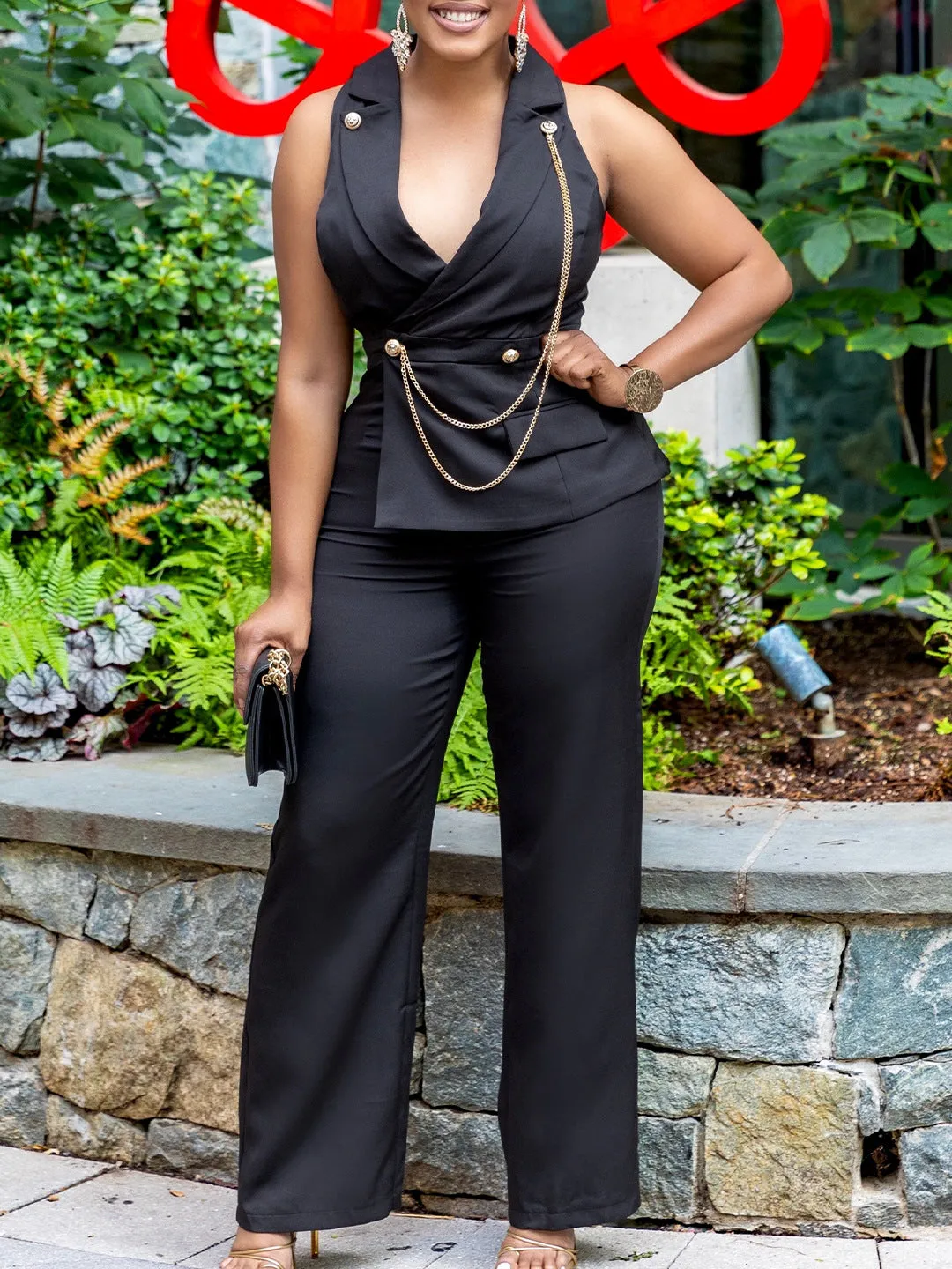 Bold Turndown Collar Wide-Leg Jumpsuit with Stylish Chain Detail