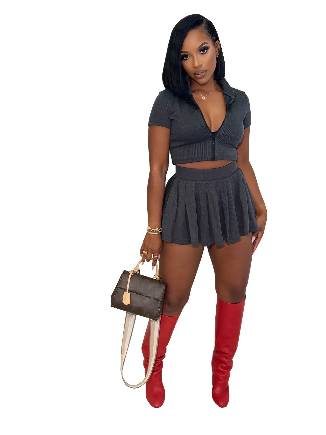 Chic Ribbed Two-Piece Set with Zip-Up Collared Top and Pleated Skirt