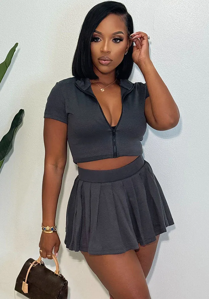 Chic Ribbed Two-Piece Set with Zip-Up Collared Top and Pleated Skirt