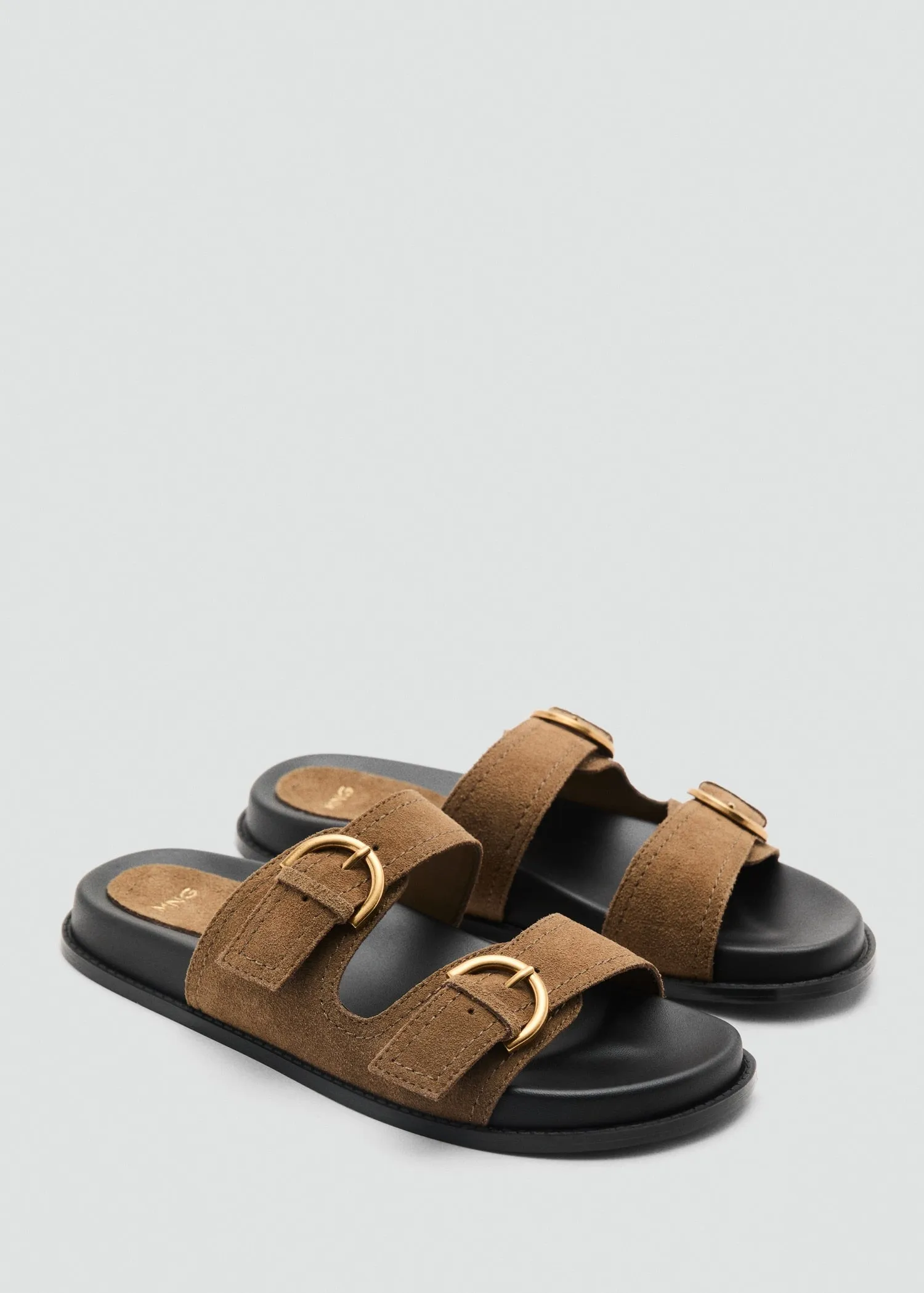 Flat leather sandal with buckles