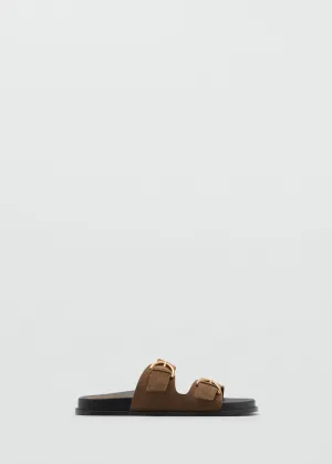 Flat leather sandal with buckles