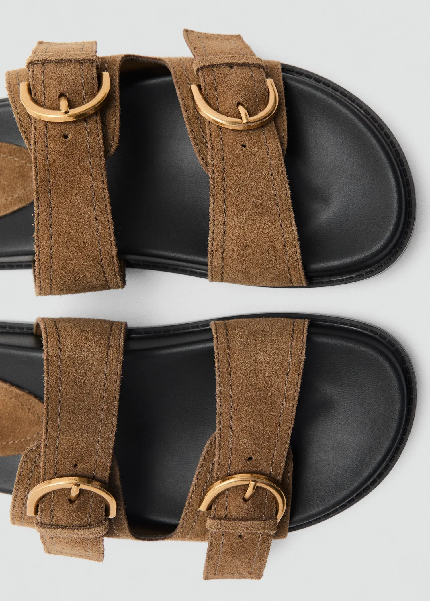 Flat leather sandal with buckles