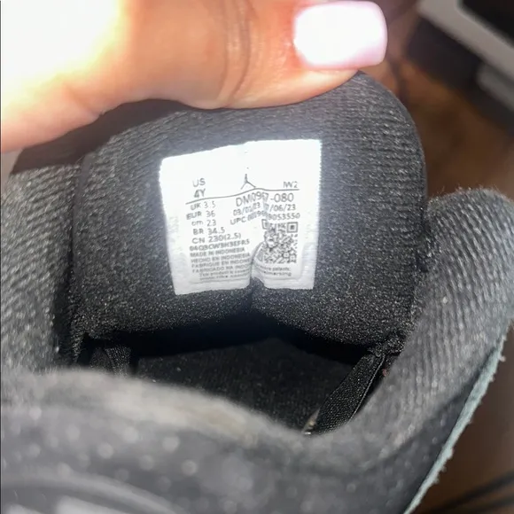 Jordan Black and Orange High-Top Sneakers