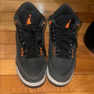 Jordan Black and Orange High-Top Sneakers