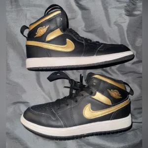 Nike Black and Gold Sneakers