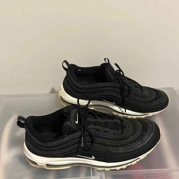 Nike means Black Sneakers