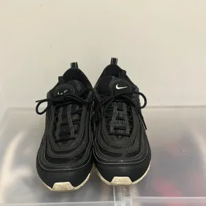 Nike means Black Sneakers